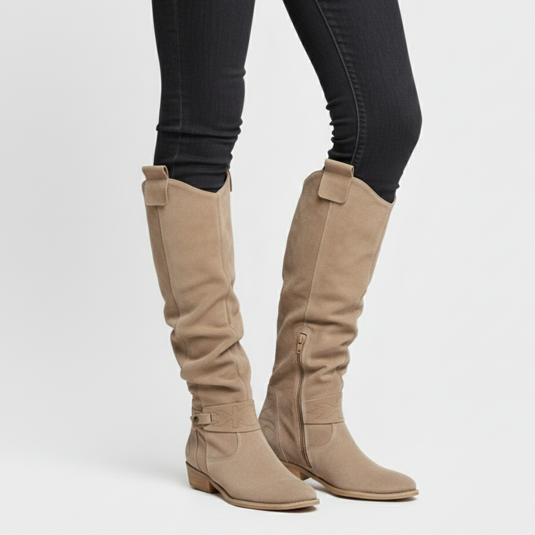 Beige knee-high boots with side buckles and a low block heel