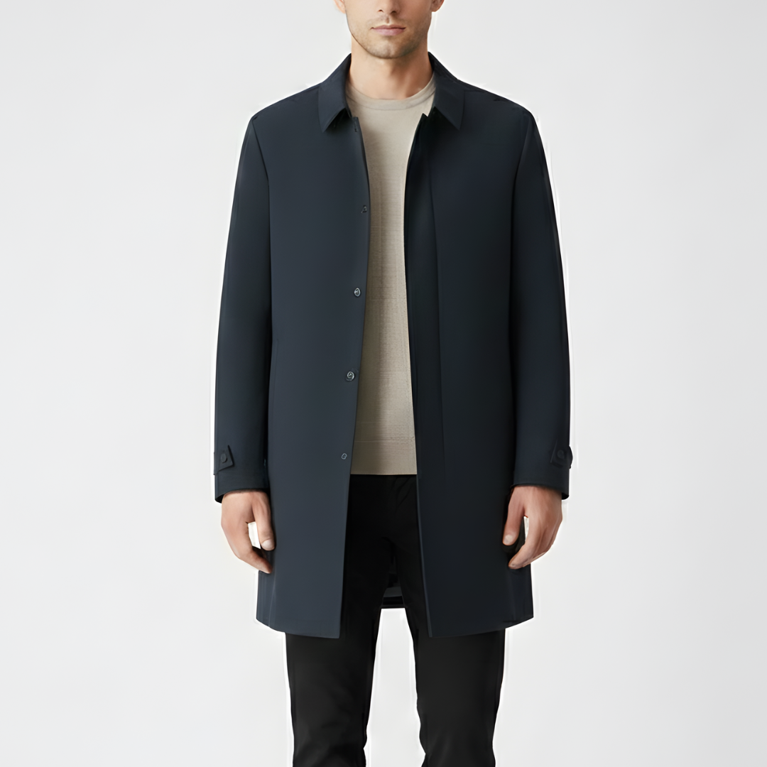 Blue quilted overcoat, long sleeves, pockets, and a turn-down collar.
